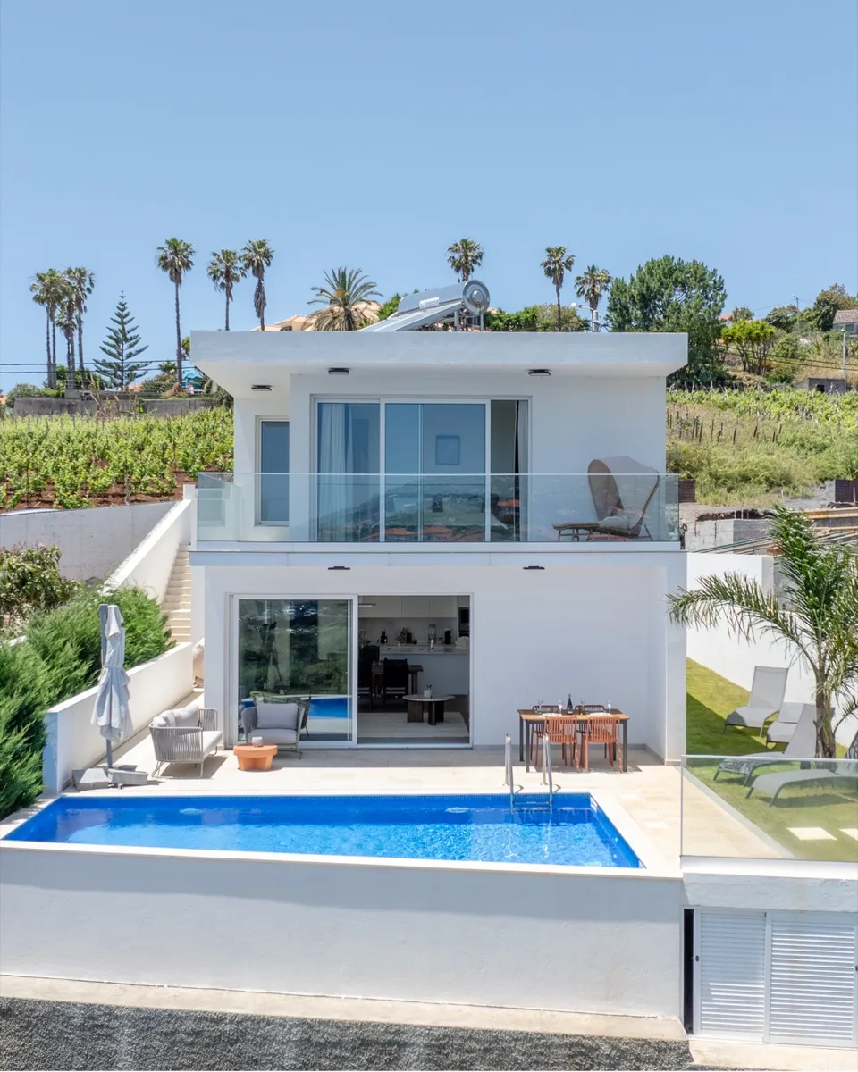 The heated pool and terrace at Villa Calma