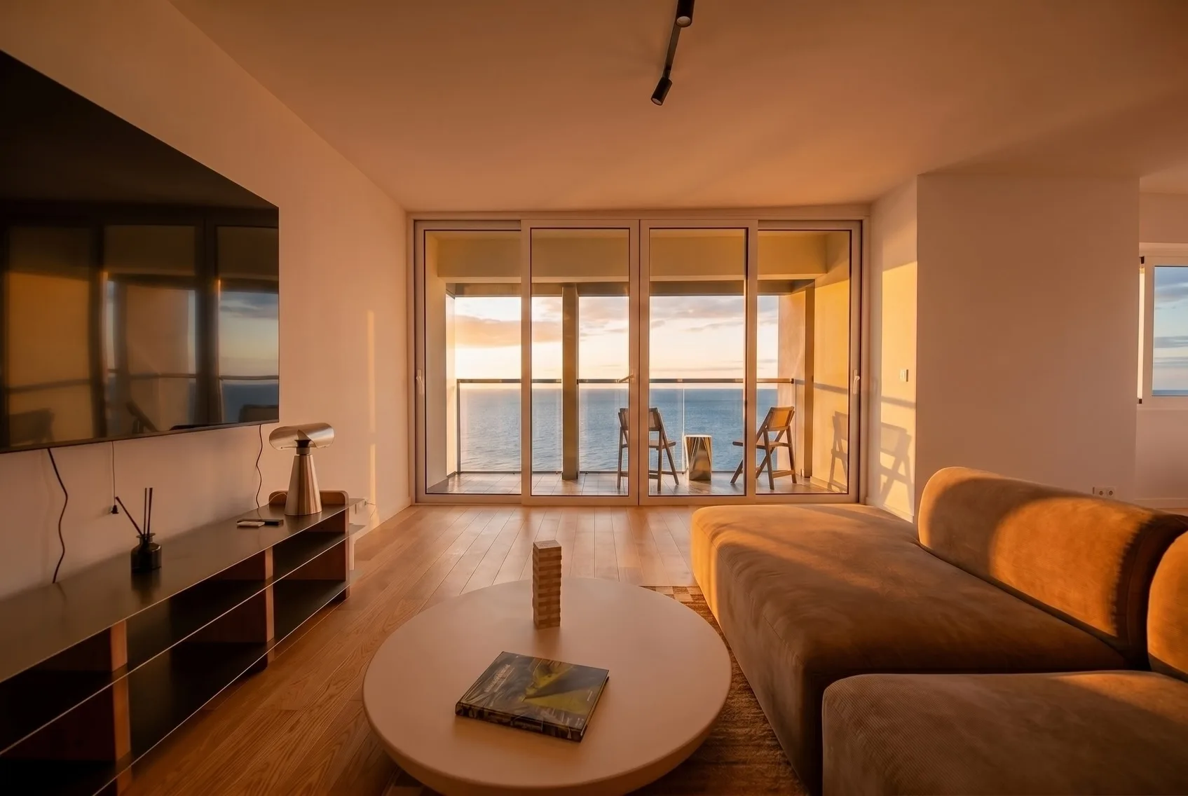 Golden evening light across the Horizon Living apartment