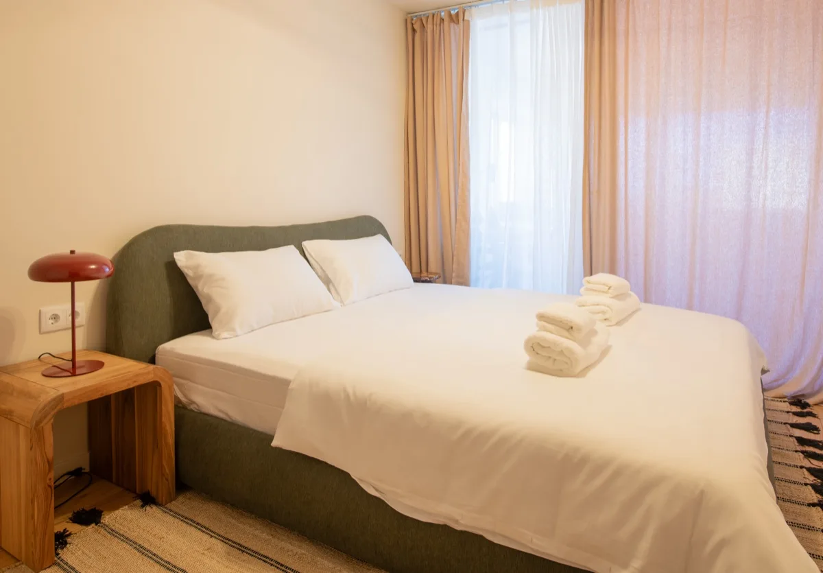 The second bedroom in soft daylight by the window