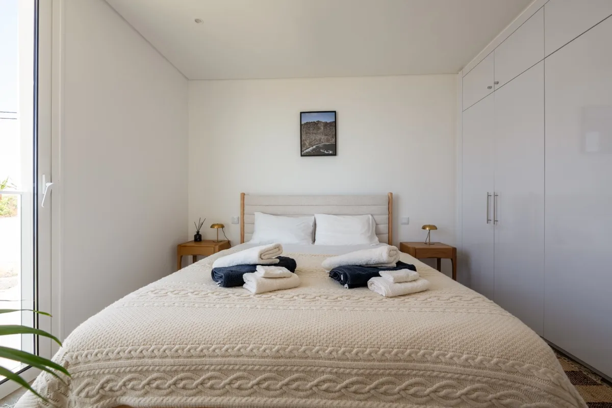 An upholstered headboard in soft daylight